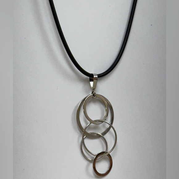 14k stamped white gold geometric pendant on a black rubber cord, gold clasp. - Picture 2 of 6
